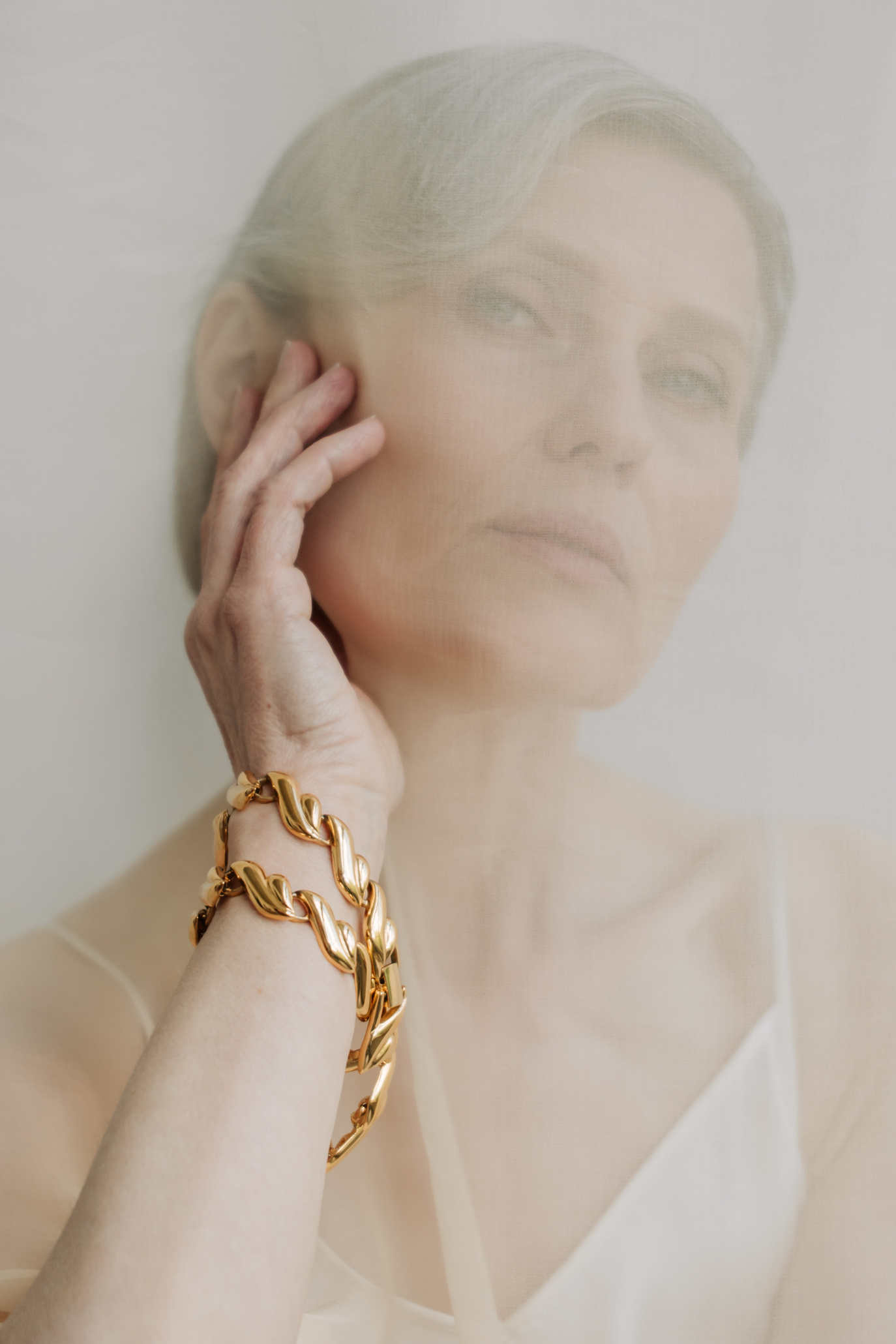 Senior Woman Wearing Gold Bracelet